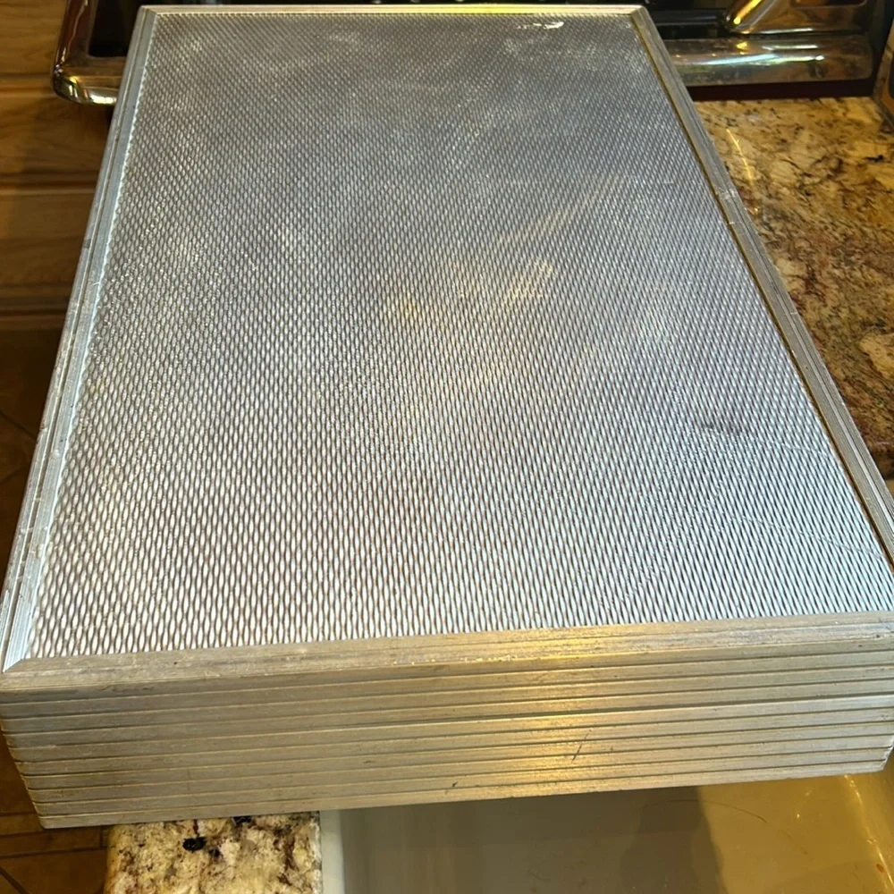Aluminum padded case, handy for carrying anything; 24”long, 13.5”wide 4” deep